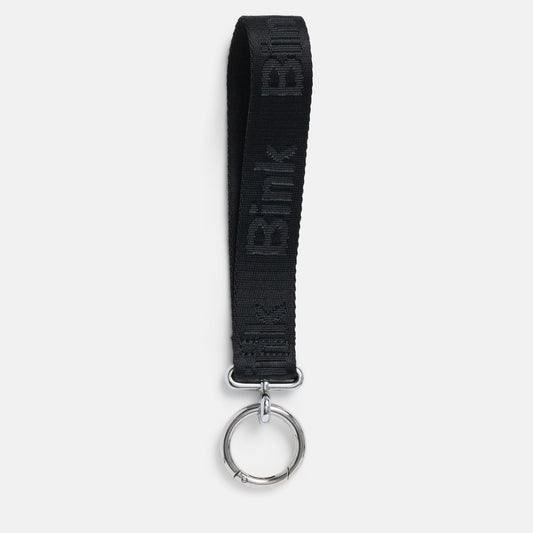 Black keychain with 'Bink' branding on a white background