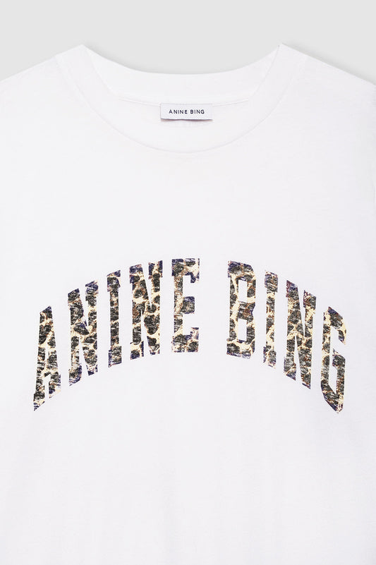 White t-shirt with 'Manne Bing' printed in black and gold on a white background