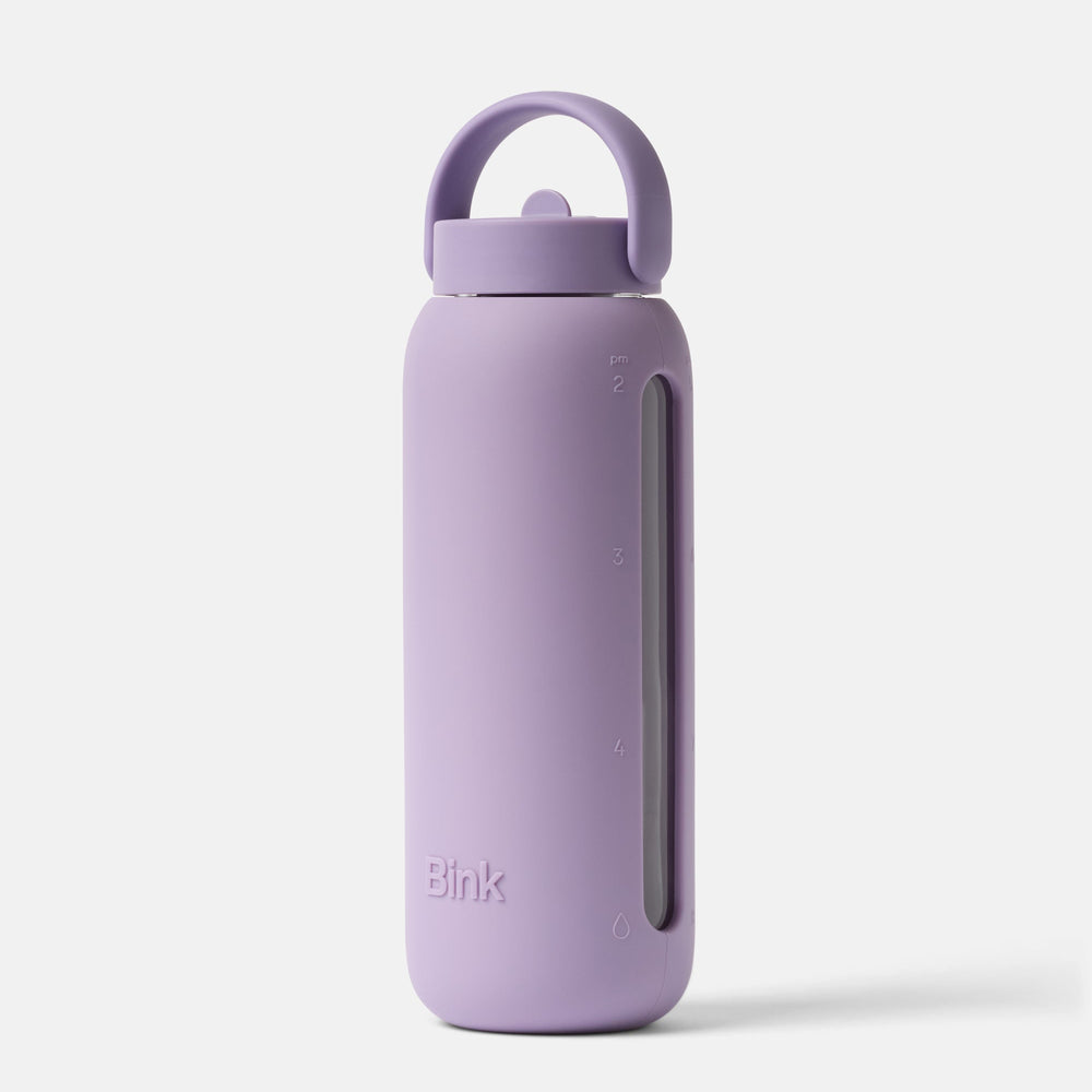 Purple water bottle with a handle on a white background