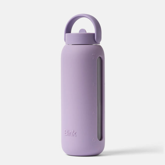 Purple water bottle with a handle on a white background