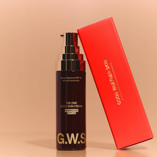 GWS sun cream bottle with red box on a beige background