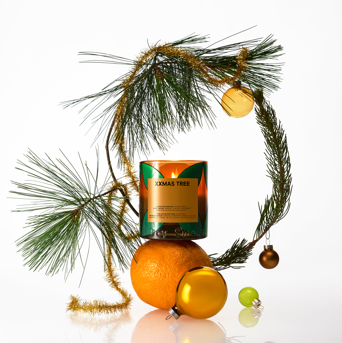 Boy Smells Xxmas Tree Candle lit