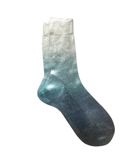 Gradient sock transitioning from light gray to dark blue on a white background