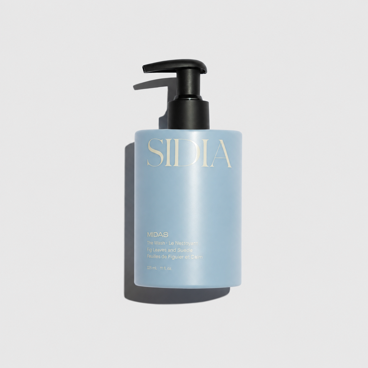 SIDIA Midab Hyalu Water Leuchtturm1911 Tinted Skin Toner in a light blue pump bottle with a black dispenser, set against a light gray background.