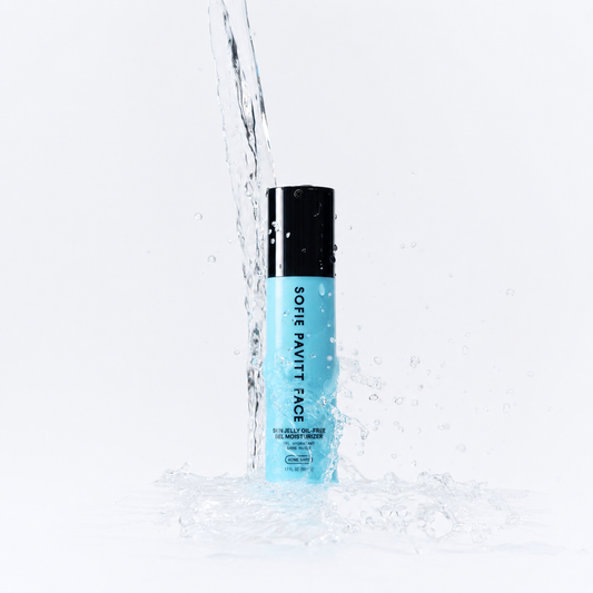A light blue and black bottle of Soier Pivott Face Gel Moisturizer stands in a water splash on a clean white background.