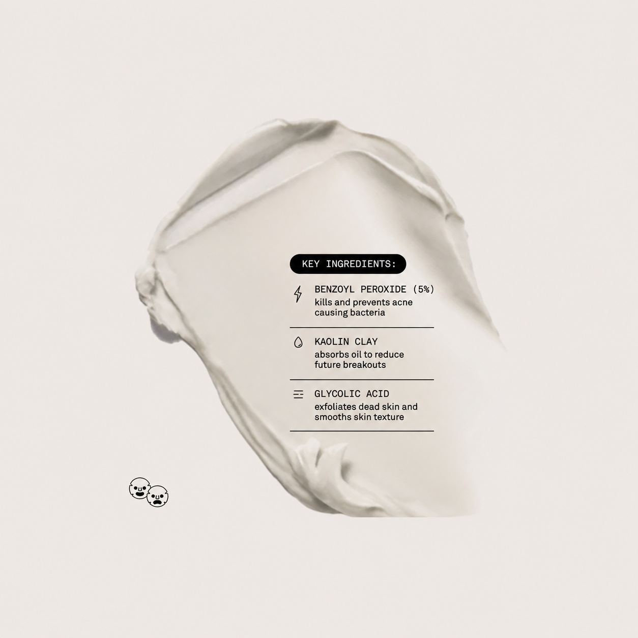 A cream-colored cosmetic product smear on a light beige background, featuring a black text label detailing key ingredients like benzoyl peroxide, kaolin clay, and glycolic acid.